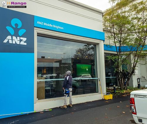 hirange window cleaner cleaning exterior windows of ANZ building
